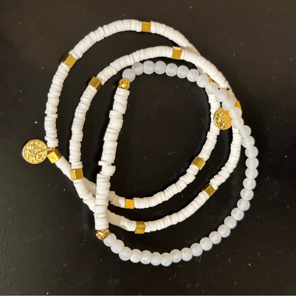 White and Gold Bracelets